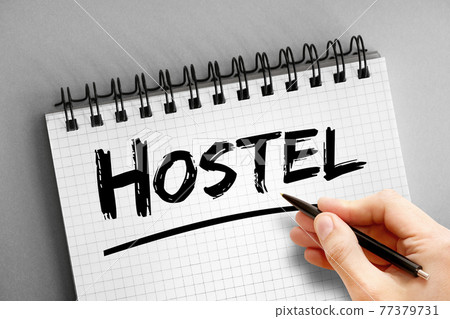 Hostel text on notepad, concept background 77379731