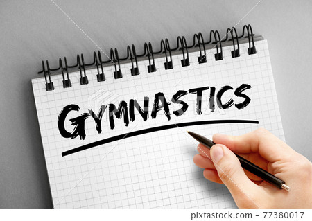 Gymnastics text on notepad, sport concept background Gymnastics text on notepad, sport concept background 77380017