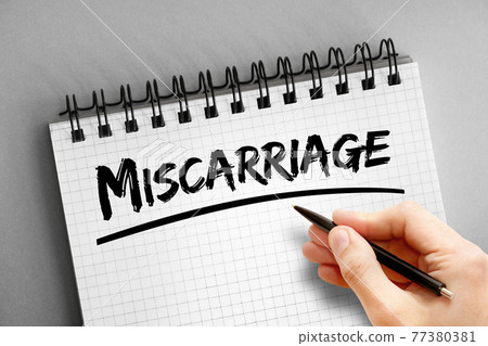 Miscarriage text on notepad, concept background Miscarriage text on notepad, concept background 77380381