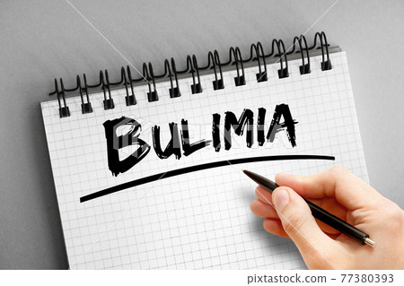 Bulimia text on notepad, health concept background Bulimia text on notepad, health concept background 77380393