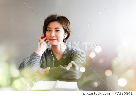 Woman spending time at home Woman spending time at home 77380841