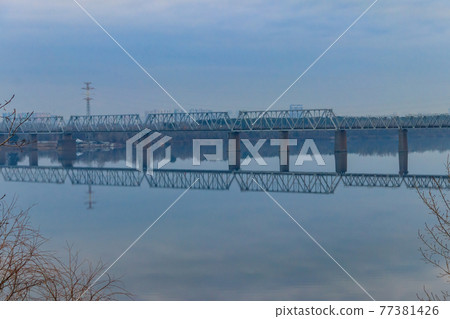View of Petrivskiy railroad bridge across the Dnieper river in Kiev, Ukraine View of Petrivskiy railroad bridge across the Dnieper river in Kiev, Ukraine 77381426