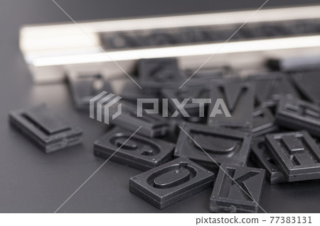 letterpress alphabet and numbers on black background letterpress alphabet and numbers on black background 77383131
