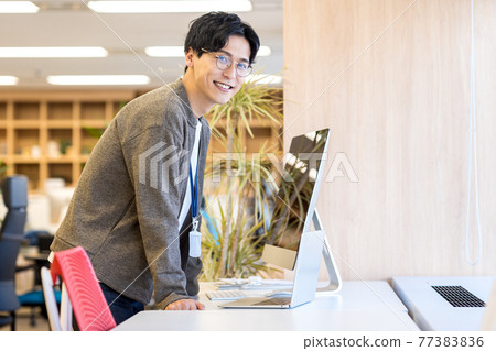 Engineer working in the office 77383836