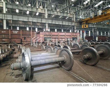 A closeup view of the wheels of a train A closeup view of the wheels of a train 77384266