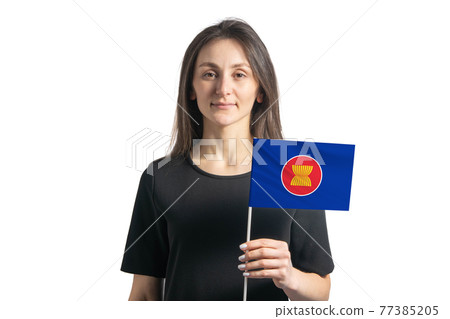 Happy young white girl holding Association of Southeast Asian Nations flag isolated on a white background Happy young white girl holding Association of Southeast Asian Nations flag isolated on a white background 77385205