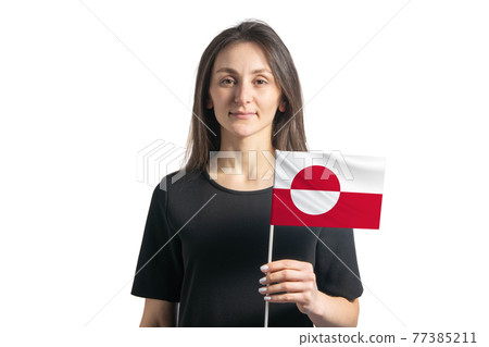 Happy young white girl holding Greenland flag isolated on a white background Happy young white girl holding Greenland flag isolated on a white background 77385211