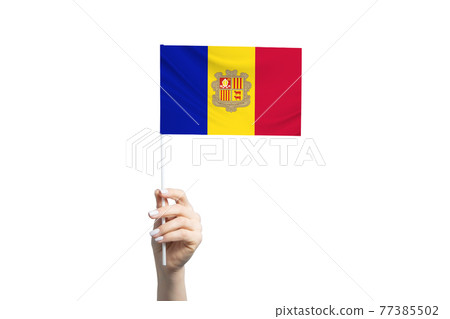 Beautiful female hand holding Andorra flag, isolated on white background Beautiful female hand holding Andorra flag, isolated on white background 77385502