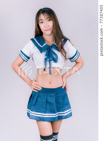 Asian women wearing Japanese anime cosplay, Japanese school uniforms 77387405
