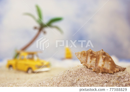 Seashell on Tropical Beach With Vintage Hot Rod Seashell on Tropical Beach With Vintage Hot Rod 77388829
