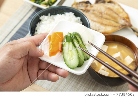 Men eating (Japanese food) Men eating (Japanese food) 77394502