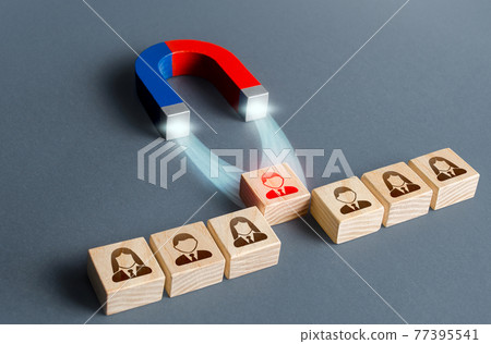 The magnet pulls a red person figure out of the row. Luring concept. Hiring best candidate. Poaching participants from other company. Selection for a management position on a competitive basis. The magnet pulls a red person figure out of the row. Luring concept. Hiring best candidate. Poaching participants from other company. Selection for a management position on a competitive basis. 77395541