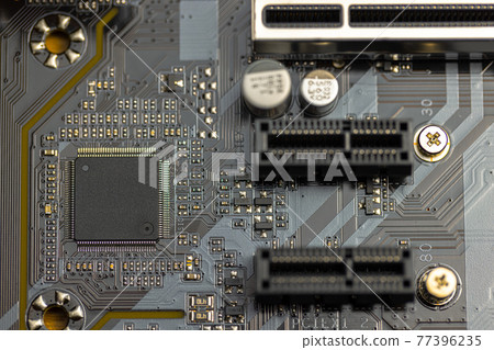 Closeup of computer board with conductors Closeup of computer board with conductors 77396235