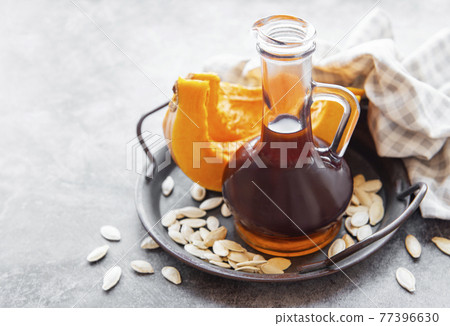 Bottle with pumpkin seed oil 77396630