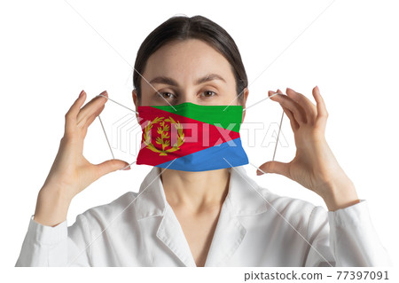 Respirator with flag of Eritrea Doctor puts on medical face mask isolated on white background Respirator with flag of Eritrea Doctor puts on medical face mask isolated on white background 77397091