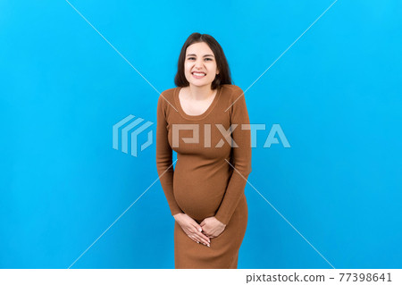 urinary incontinence during pregnancy. Abdominal pain during pregnancy. Maternity healthcare concept on colored background urinary incontinence during pregnancy. Abdominal pain during pregnancy. Maternity healthcare concept on colored background 77398641