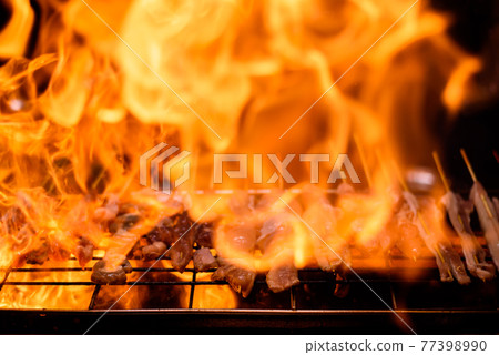 Variety of Barbecue skewers meat kebabs with vegetables on hot flaming grill Variety of Barbecue skewers meat kebabs with vegetables on hot flaming grill 77398990