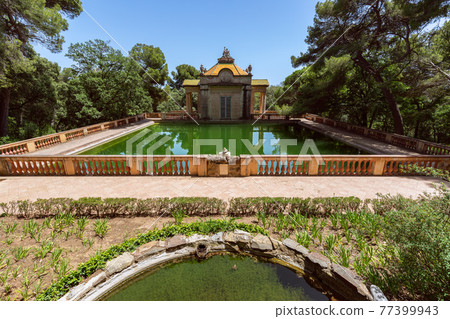 Emerald water pond in the famous Park of the Labyrinth of Horta (Parc del Laberint d'Horta) Emerald water pond in the famous Park of the Labyrinth of Horta (Parc del Laberint d'Horta) 77399943