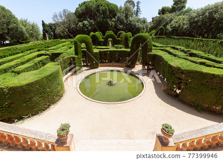 The entrance to the famous labyrinth in Park of the Labyrinth of Horta (Parc del Laberint d'Horta) The entrance to the famous labyrinth in Park of the Labyrinth of Horta (Parc del Laberint d'Horta) 77399946
