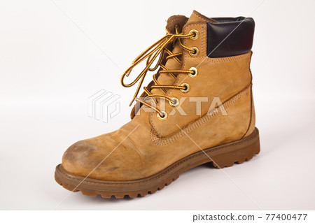 Hiking shoes and a white background, Sturdy hiking boots 77400477