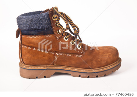 Hiking shoes and a white background, Sturdy hiking boots Hiking shoes and a white background, Sturdy hiking boots 77400486
