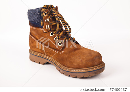 Hiking shoes and a white background, Sturdy hiking boots 77400487