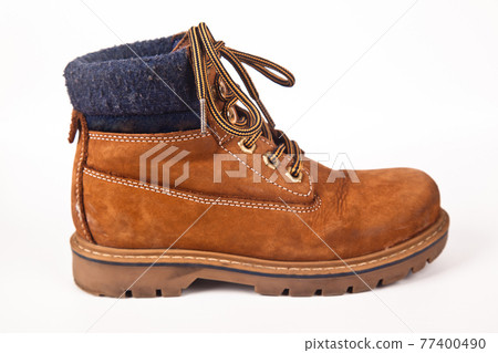 Hiking shoes and a white background, Sturdy hiking boots 77400490