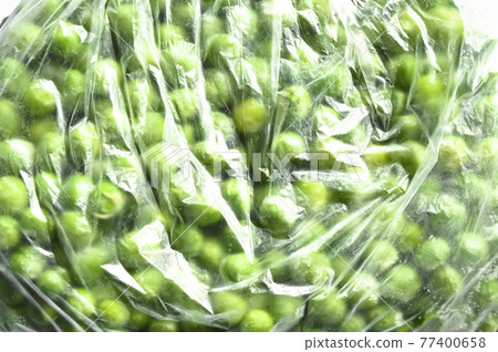 Frozen fresh green and peas grains in sachets, nutritious and healthy green vegetables 77400658