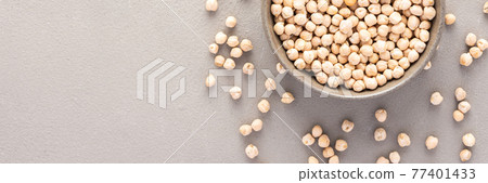 Legumes in bowl and scattered in the background Legumes in bowl and scattered in the background 77401433