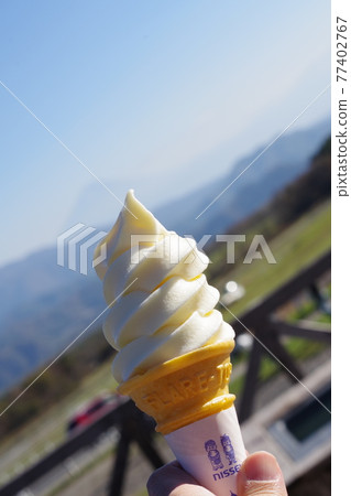 Soft serve ice cream to eat under the blue sky Soft serve ice cream to eat under the blue sky 77402767