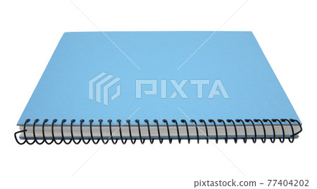 Blue spiral notebook isolated on white background Blue spiral notebook isolated on white background 77404202