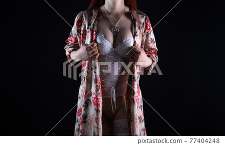 Image of the adult woman in silk negligee Image of the adult woman in silk negligee 77404248