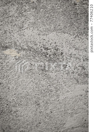 An old grunge texture, gray concrete wall with spotted surface. An old grunge texture, gray concrete wall with spotted surface. 77406210