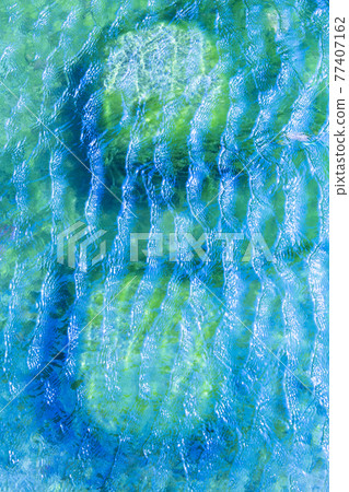 Emerald green shallow riffle sea level 77407162