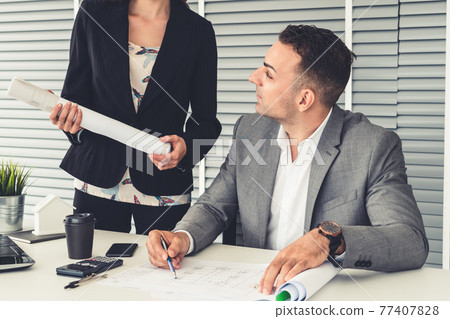 Businessman boss and businesswoman in office. Businessman boss and businesswoman in office. 77407828