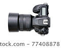 Top view of a new modern black DSLR camera isolated on a white background. PNG file with transparent background. 77408878