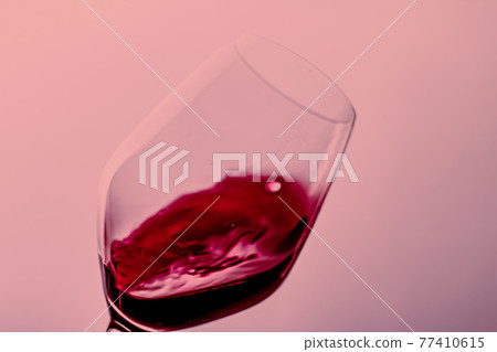 Red wine in crystal glass, alcohol drink and luxury aperitif, oenology and viticulture product Red wine in crystal glass, alcohol drink and luxury aperitif, oenology and viticulture product 77410615