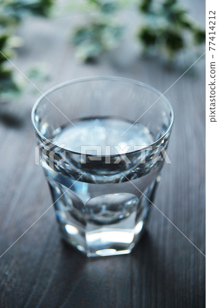 Water that entered the glass Water that entered the glass 77414212