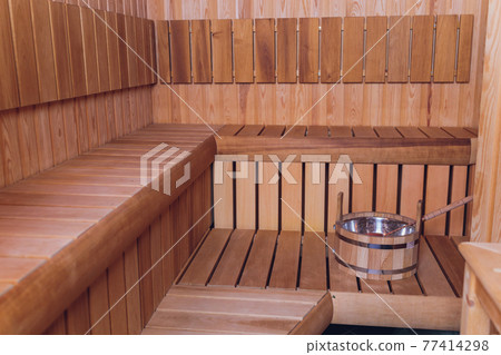 Sauna interior - Relax in a hot sauna. Sauna interior - Relax in a hot sauna. 77414298