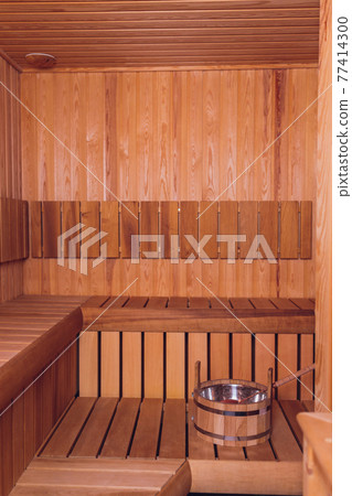 Sauna interior - Relax in a hot sauna. Sauna interior - Relax in a hot sauna. 77414300