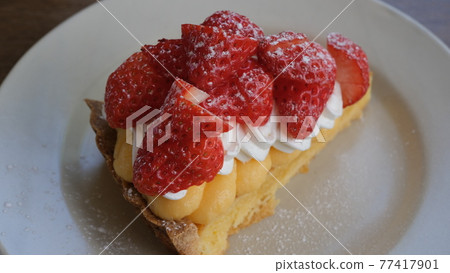 Strawberry tart taken from an angle 77417901