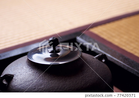 Tea ceremony in a tea room Tea ceremony in a tea room 77420371