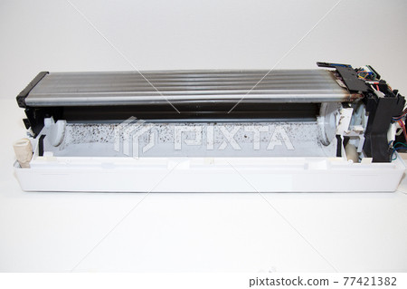 Dirt inside the disassembled air conditioner Dirt inside the disassembled air conditioner 77421382