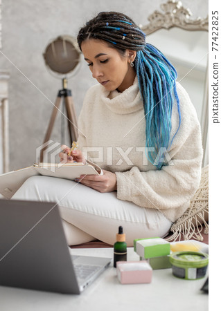 Hipster businesswoman employee of networking business marketing watching online meeting use laptop Hipster businesswoman employee of networking business marketing watching online meeting use laptop 77422825