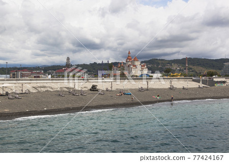 Beach in the resort settlement of Adler near Sochi Park Beach in the resort settlement of Adler near Sochi Park 77424167