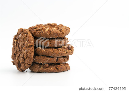 Stack of homemade sweet chocolate cookies on white. Stack of homemade sweet chocolate cookies on white. 77424595