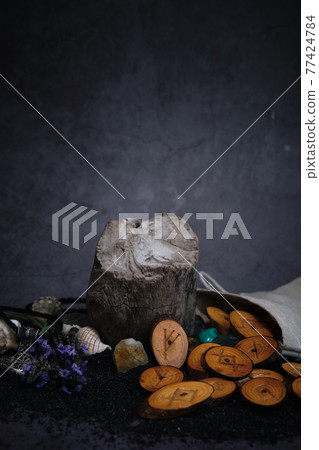 homemade wooden runes on a dark background homemade wooden runes on a dark background 77424784
