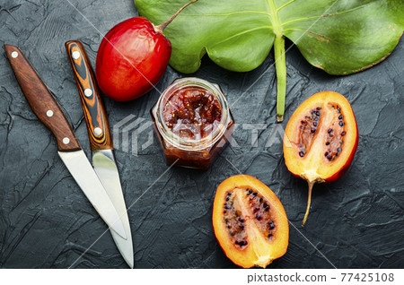 Jar of tamarillo jam. Jar of tamarillo jam. 77425108