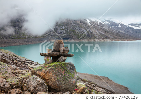 Cairn at Styggevatnet glacial lake Luster Sogn og Fjordane Norway Scandinavia 77426129