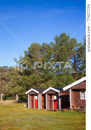 Wooden camping cabins at a campsite in Norway Scandinavia Wooden camping cabins at a campsite in Norway Scandinavia 77427254